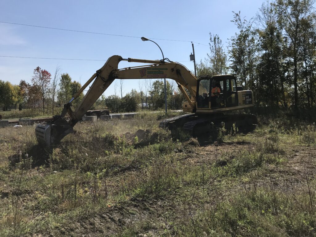 Travaux d'échantillonnage lors d'une évaluation environnementale de site phase II